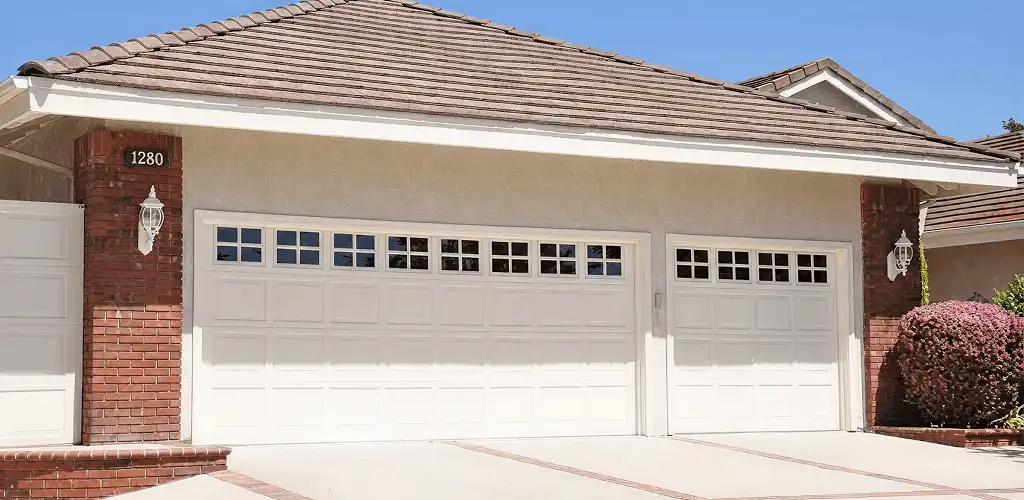 Residential garage door repair service for a double garage door in Irvine, CA
