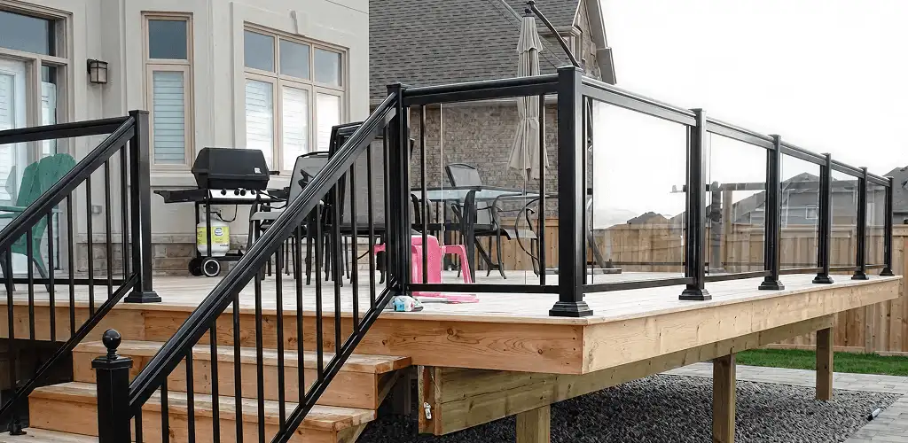 Handrail installation on a deck staircase for safety and code compliance in Irvine, CA